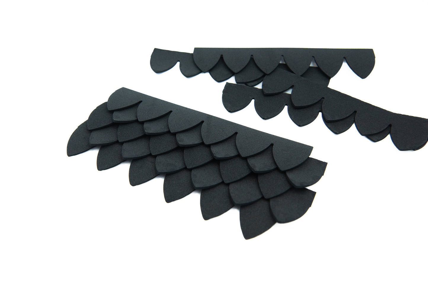 Pre-cut foam scales row